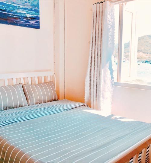 Hình ảnh Phòng 1 giường Làng Biển Homstay